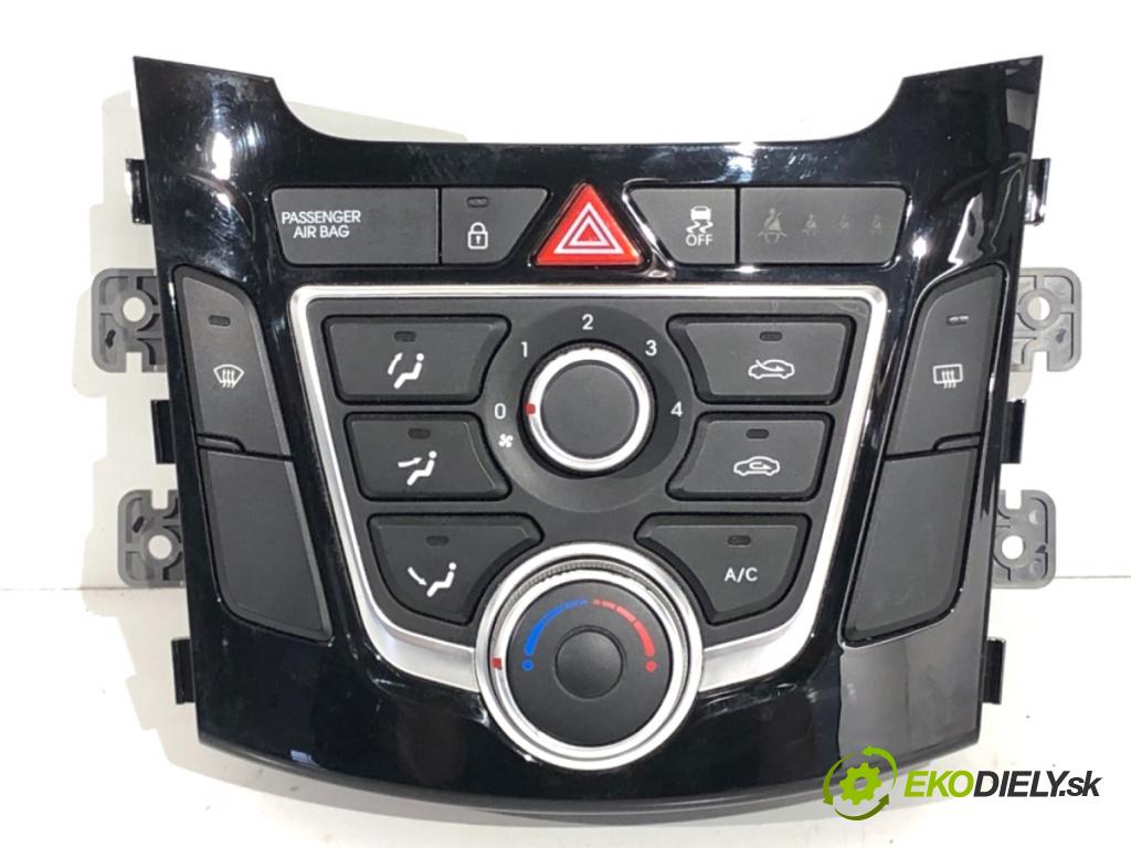 HYUNDAI i30 liftback 2013 66 kW 1.4 CRDi 1396 Panel ovládania kúrenia 97250-A6040GU (Prepínacie páčky pod volantom)