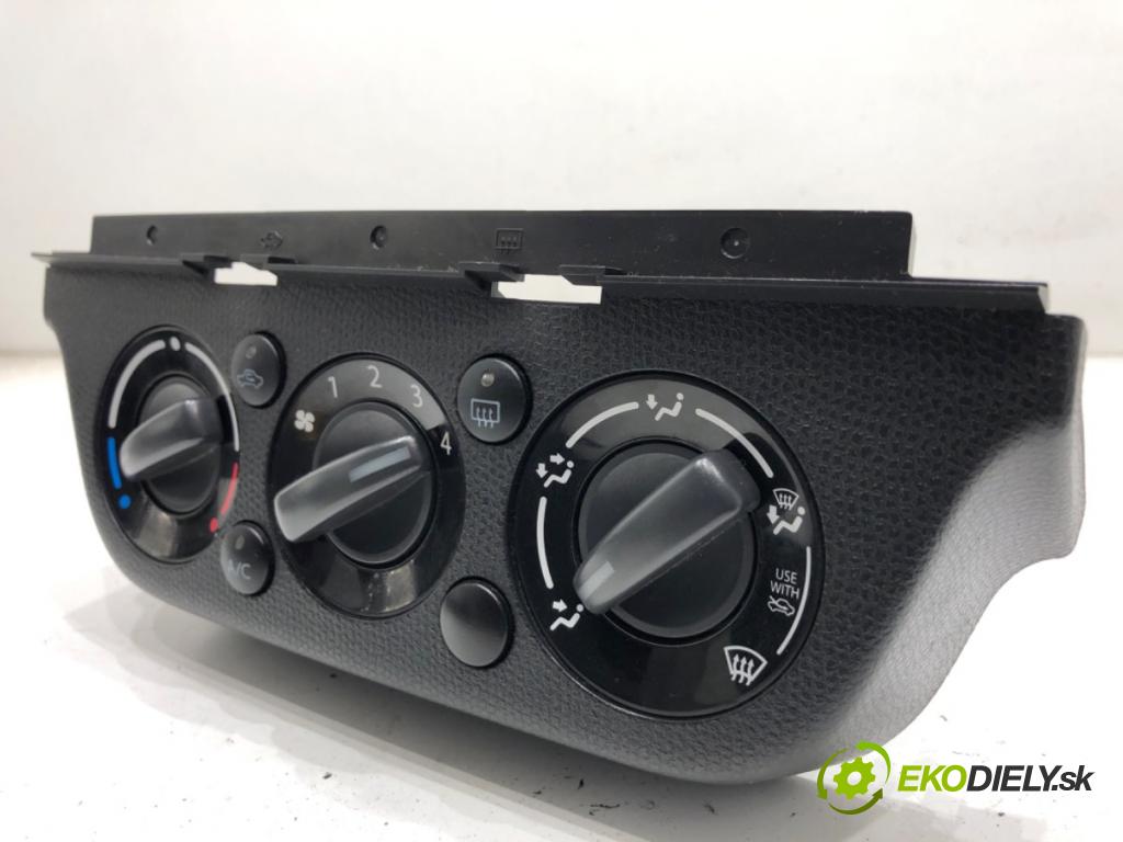 SUZUKI SWIFT III liftback 2006 68 kW 1.3 (RS 413) 1328 Panel ovládania kúrenia  (Prepínacie páčky pod volantom)