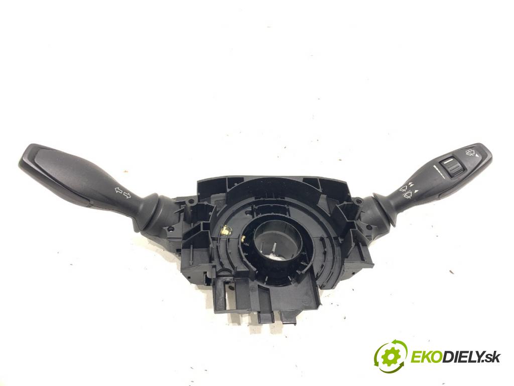 FORD FIESTA MK7 liftback 2012 51 kW 1.4 TDCi 1399 Prepínač kombinovaný 8A6T-13N064-AH (Prepínacie páčky pod volantom)