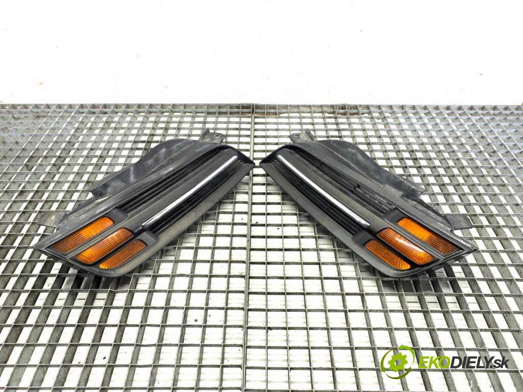 NISSAN MICRA K12 liftback 2005 65 kW 1.4 16V 1386 mřížka maska  (Přední mřížka (maska chladiče))