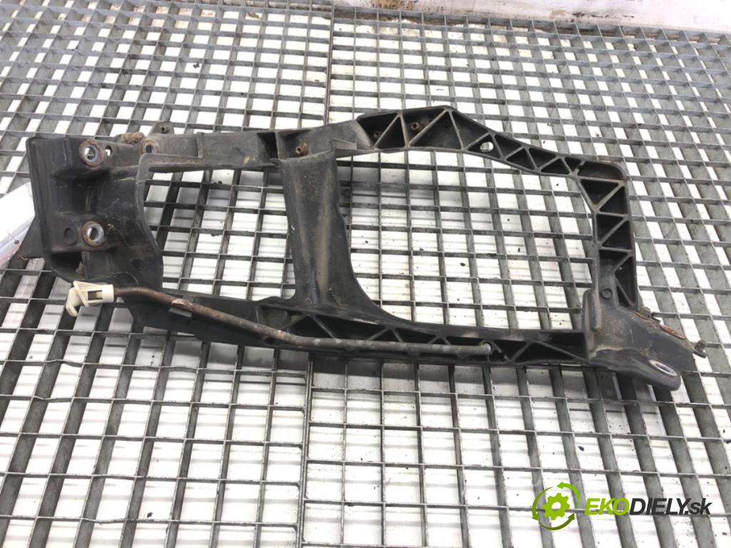 MITSUBISHI COLT VI liftback 2005 55 kW 1.1 1124 uchycení světla levý MN105059