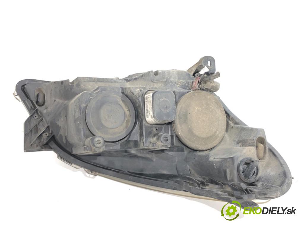 OPEL ASTRA H Kombi 2006 66 kW 1.4 (L35) 1364 světlomet levý přední část 24451032