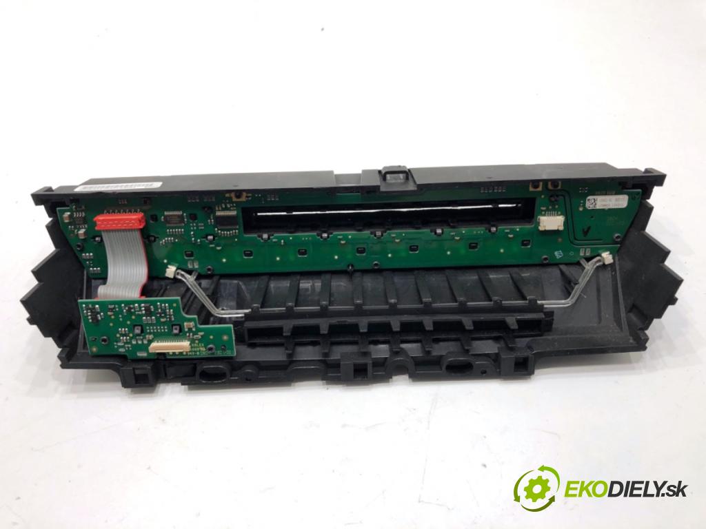 BMW E71 SUV 2013 180 kW xDrive 30 d 2993 Panel ovládania radia  (Prepínacie páčky pod volantom)