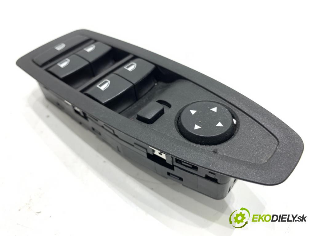 BMW F39 SUV 2019 103 kW sDrive 18 i 1499 Prepínač okien 9208109 (Prepínacie páčky pod volantom)