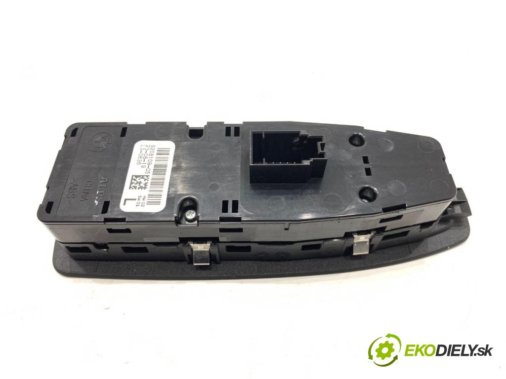 BMW F39 SUV 2019 103 kW sDrive 18 i 1499 Prepínač okien 9208109 (Prepínacie páčky pod volantom)