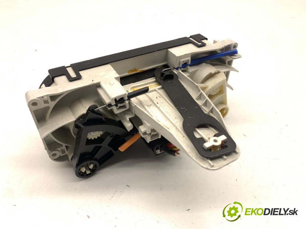 NISSAN MICRA K12 liftback 2003 59 kW 1.2 16V 1240 Panel ovládania kúrenia 27515-AX701 (Prepínacie páčky pod volantom)