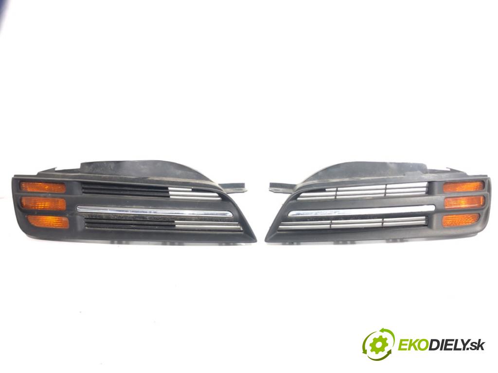 NISSAN MICRA K12 liftback 2003 59 kW 1.2 16V 1240 mřížka maska  (Přední mřížka (maska chladiče))