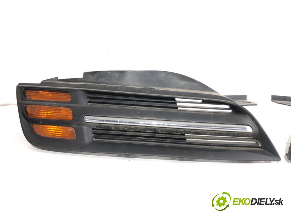 NISSAN MICRA K12 liftback 2003 59 kW 1.2 16V 1240 mřížka maska  (Přední mřížka (maska chladiče))