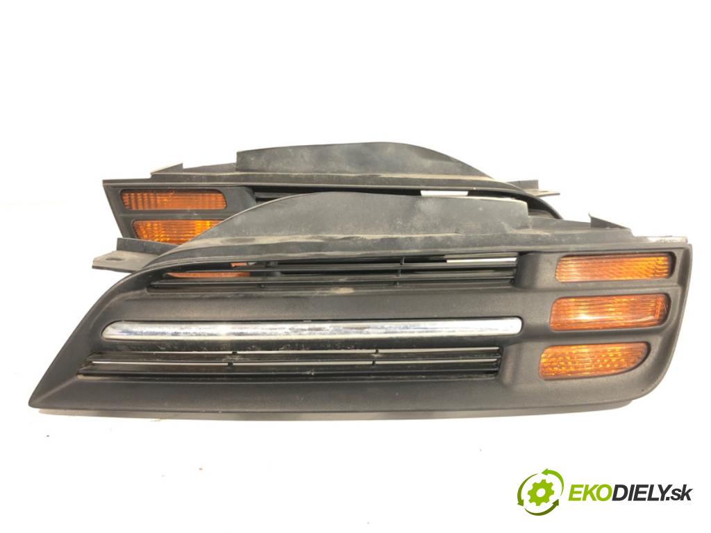 NISSAN MICRA K12 liftback 2003 59 kW 1.2 16V 1240 mřížka maska  (Přední mřížka (maska chladiče))