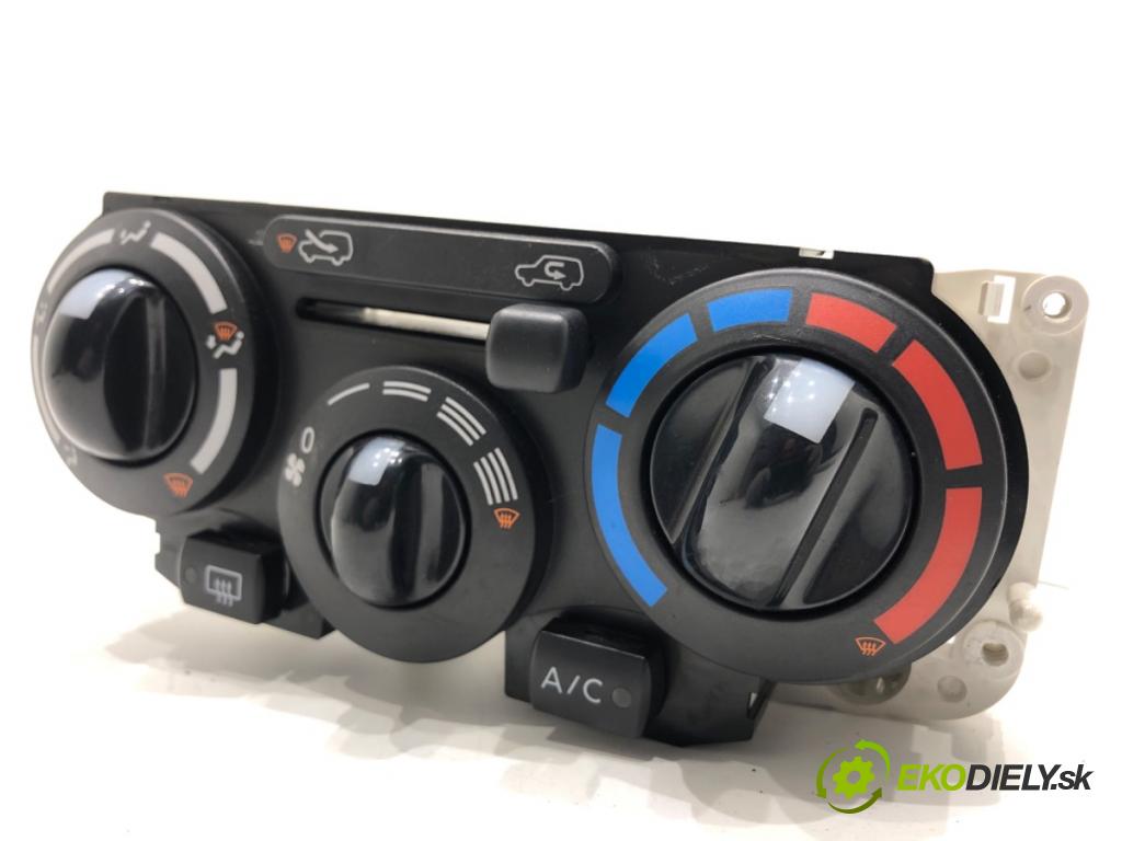 NISSAN MICRA K12 liftback 2009 48 kW 1.2 16V 1240 Panel ovládania kúrenia N104792L (Prepínacie páčky pod volantom)