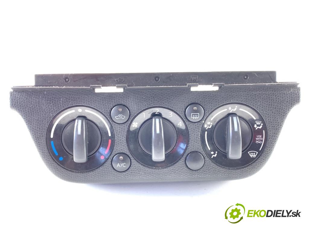 SUZUKI SWIFT III liftback 2009 68 kW 1.3 (RS 413) 1328 Panel ovládania kúrenia  (Prepínacie páčky pod volantom)
