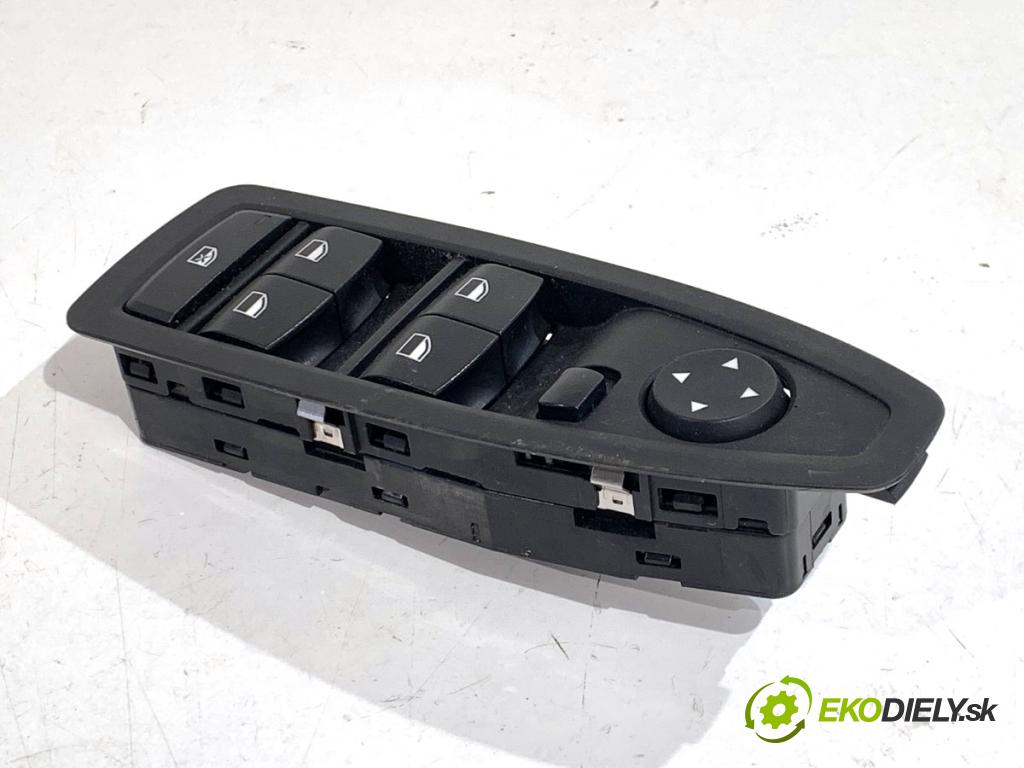 BMW F48 SUV 2018 103 kW sDrive 18 i 1499 Prepínač okien 9297346 (Prepínacie páčky pod volantom)