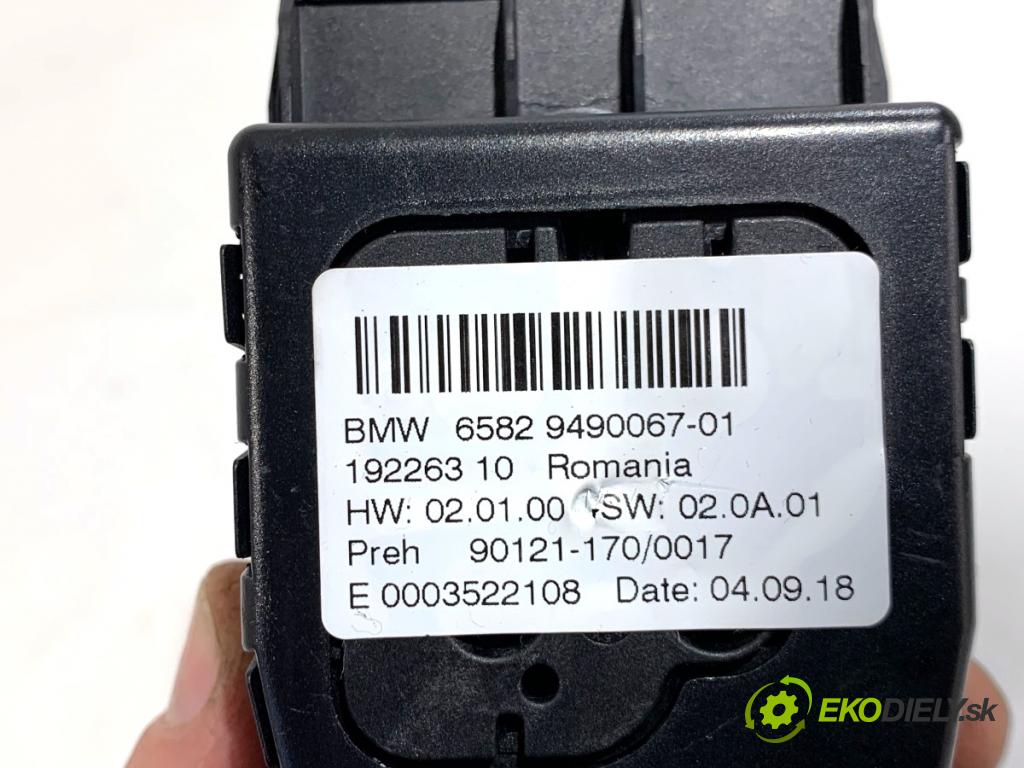 BMW F48 SUV 2018 103 kW sDrive 18 i 1499 Panel ovládania radia 9490067 (Prepínacie páčky pod volantom)