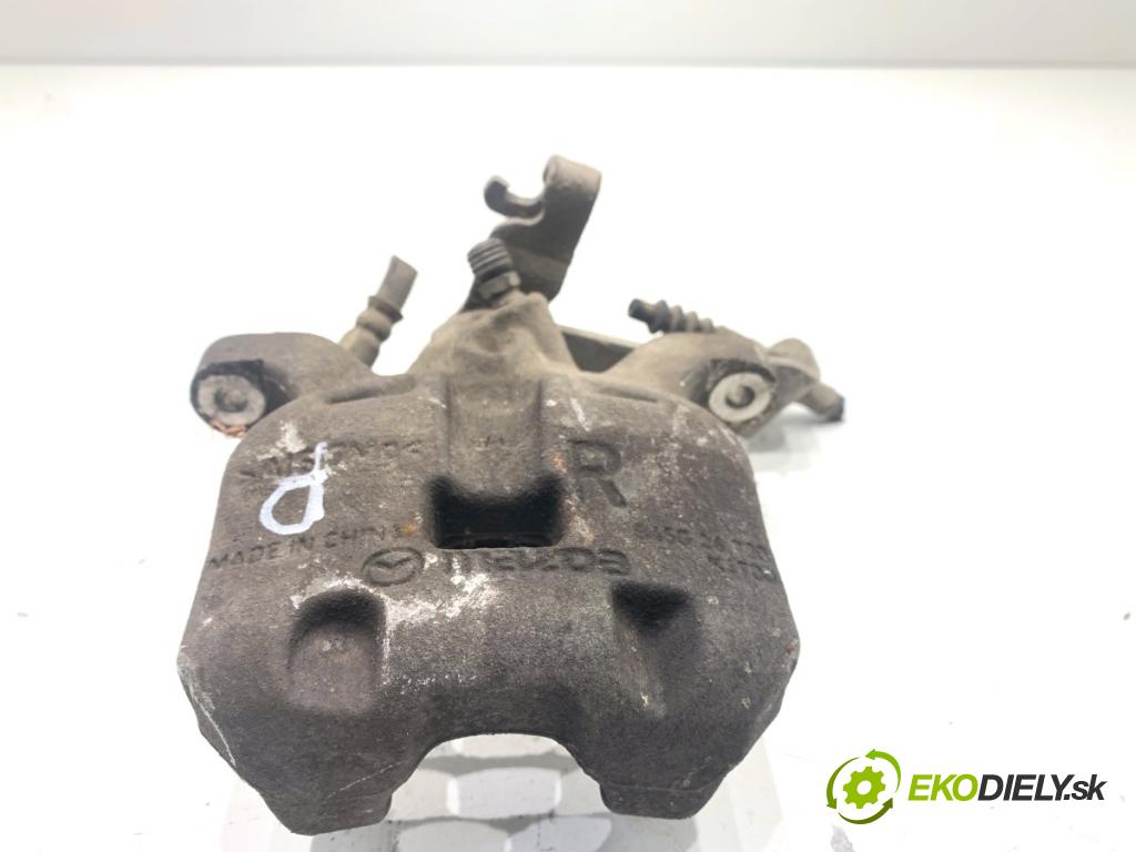 MAZDA 3 BM sedan 2016 88 kW 2.0 1998 brzdič třmen pravý zadní část 