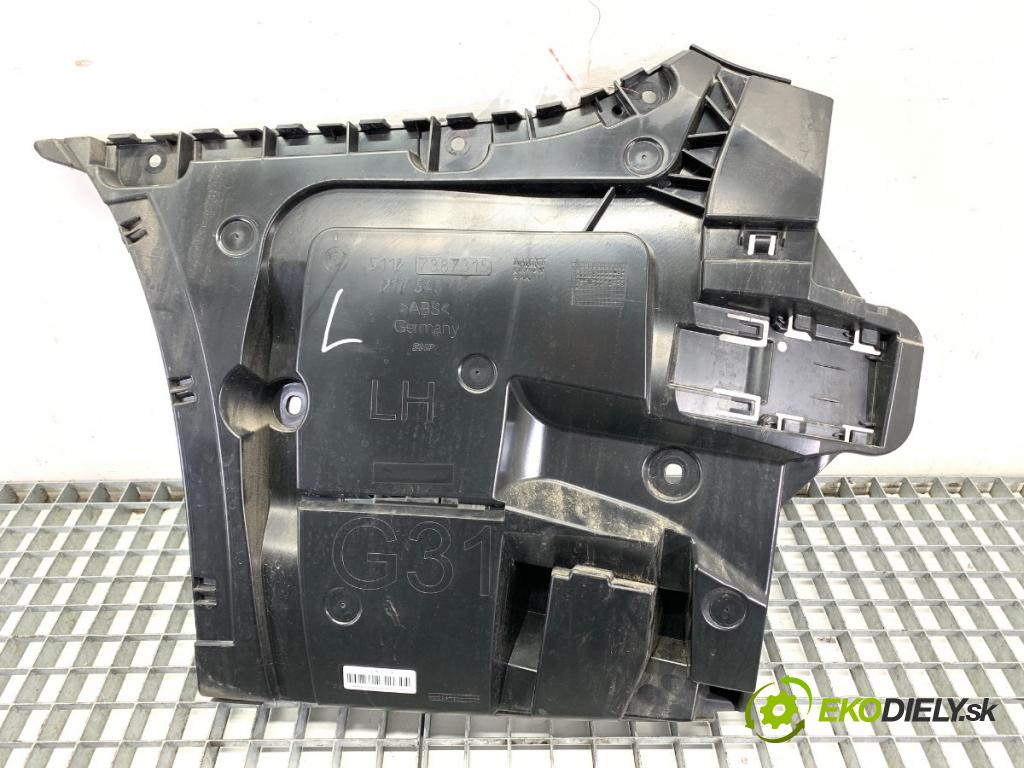 BMW G31 Kombi 2020 140 kW 520 d 1995 Úchyt nárazníka ľavy zad 7387315