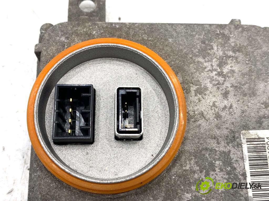 VW PASSAT B7 sedan 2013 103 kW 2.0 TDI 1968 Menič XENON 8K0941597B (Riadiaca jednotka xenónu)