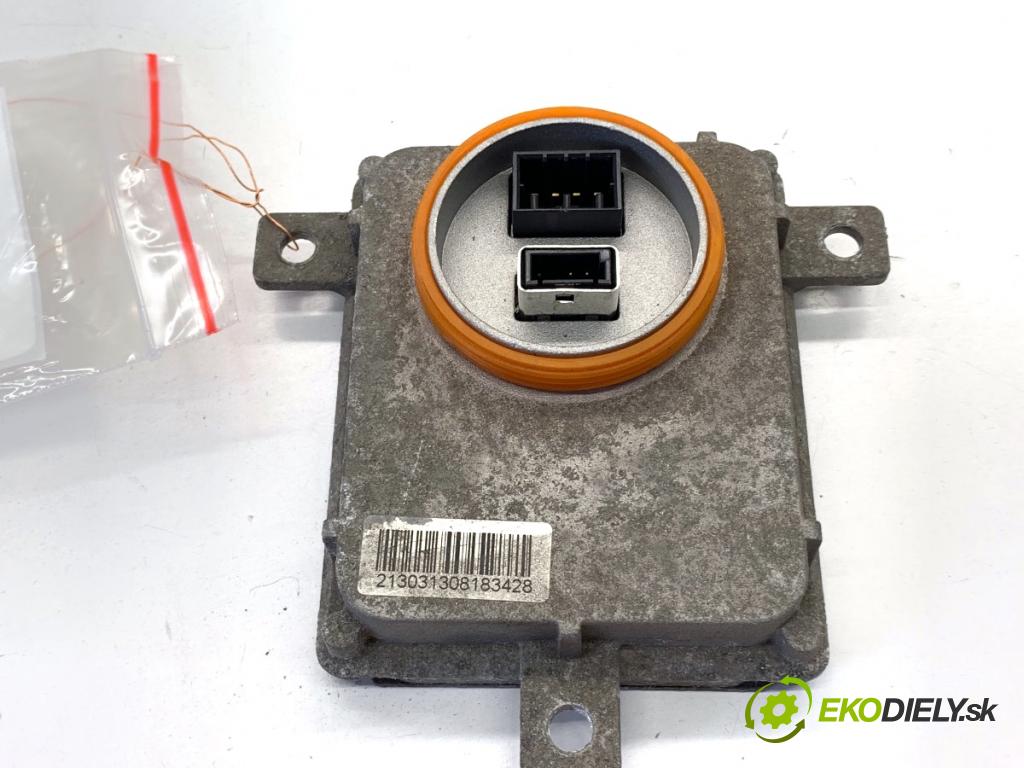 VW PASSAT B7 sedan 2013 103 kW 2.0 TDI 1968 Menič XENON 8K0941597B (Riadiaca jednotka xenónu)