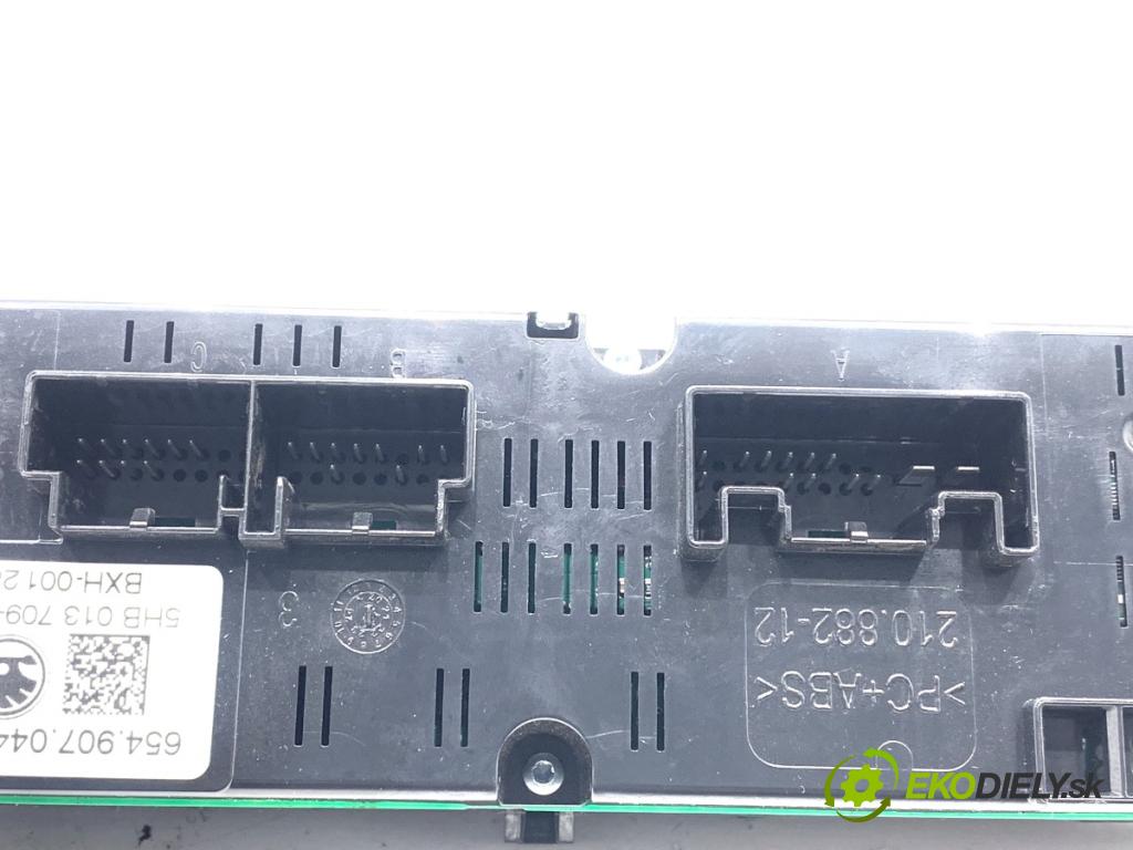 SKODA SCALA liftback 2022 110 kW 1.5 TSI 1495 Panel ovládania kúrenia 654907044G (Prepínacie páčky pod volantom)