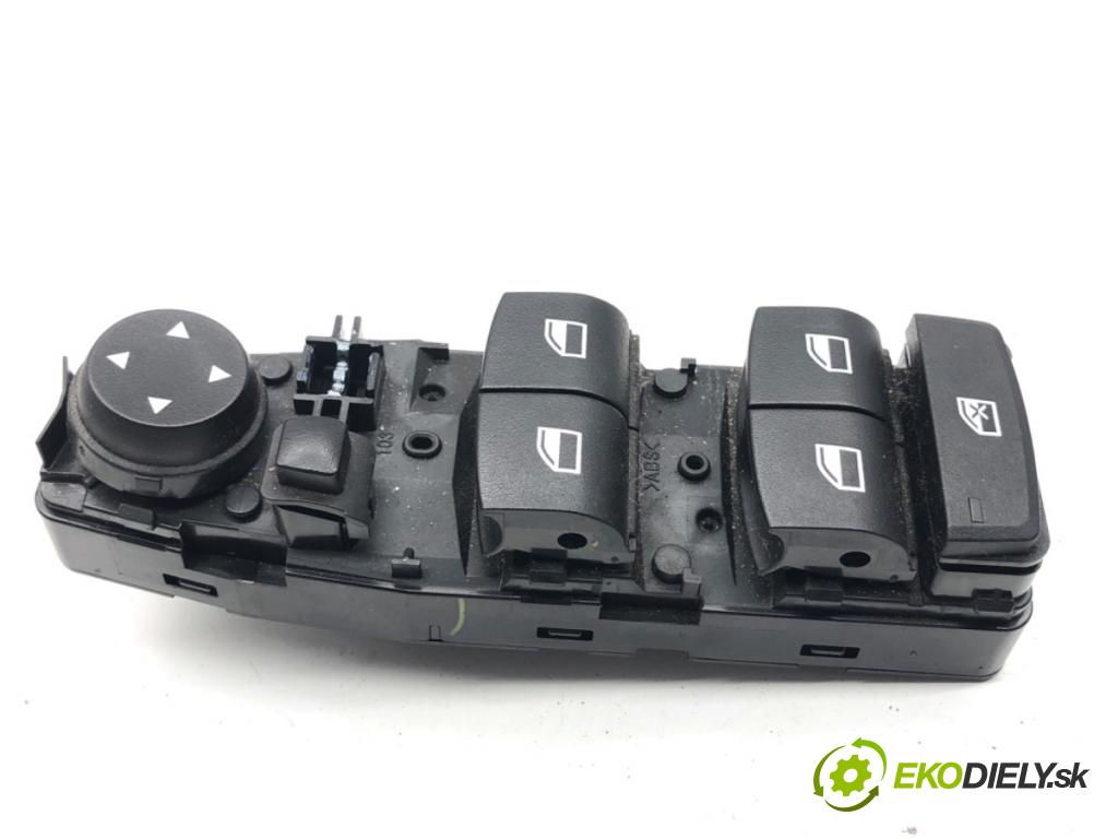 BMW F25 SUV 2013 190 kW xDrive 30 d 2993 Prepínač okien 9208111 (Prepínacie páčky pod volantom)