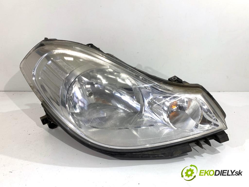 RENAULT THALIA II sedan 2011 55 kW 1.2 16V (LU2V) 1149 světlomet pravý přední část 7701070631