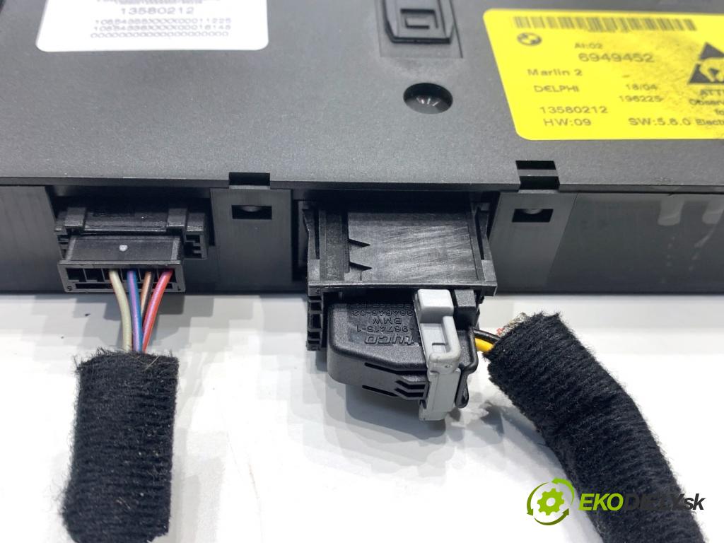 BMW E60 sedan 2004 170 kW 530 i 2979 Prepínač ohrievania, vyhrievania sedačky 6949452 (Prepínacie páčky pod volantom)