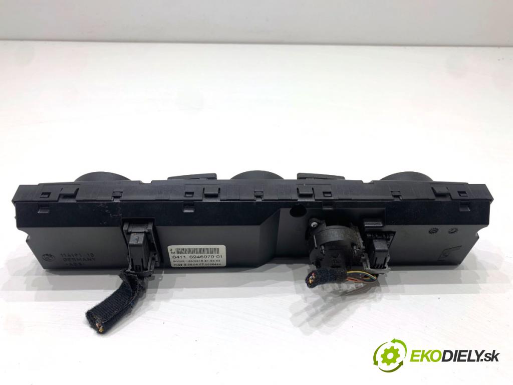 BMW E60 sedan 2004 170 kW 530 i 2979 Panel ovládania kúrenia 6946979 (Prepínacie páčky pod volantom)