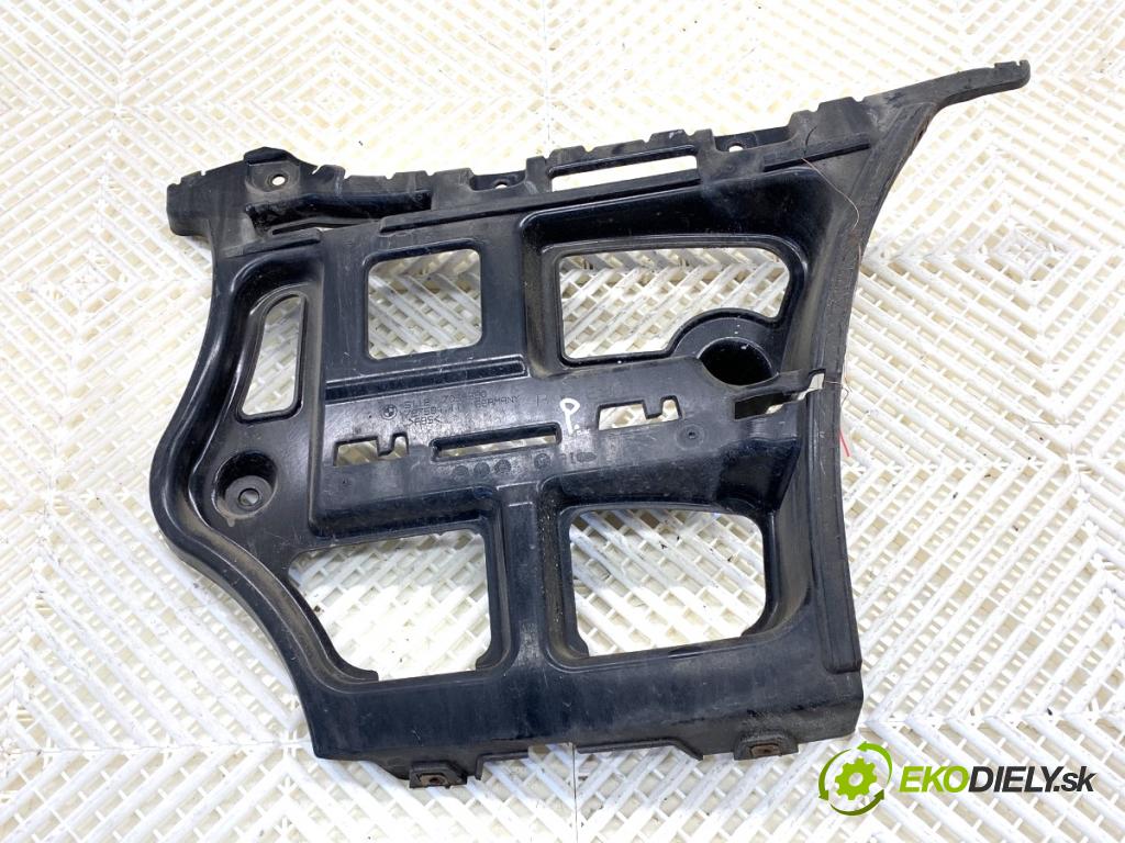 BMW E90 sedan 2006 95 kW 318 i 1995 Úchyt nárazníka pravy zad 7058520