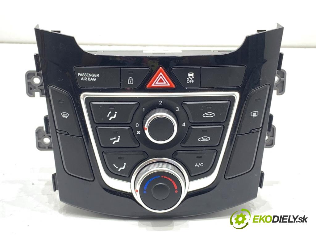 HYUNDAI i30 liftback 2014 74 kW 1.4 1368 Panel ovládania kúrenia 97250-A6040GU 97250-A5XXX (Prepínacie páčky pod volantom)