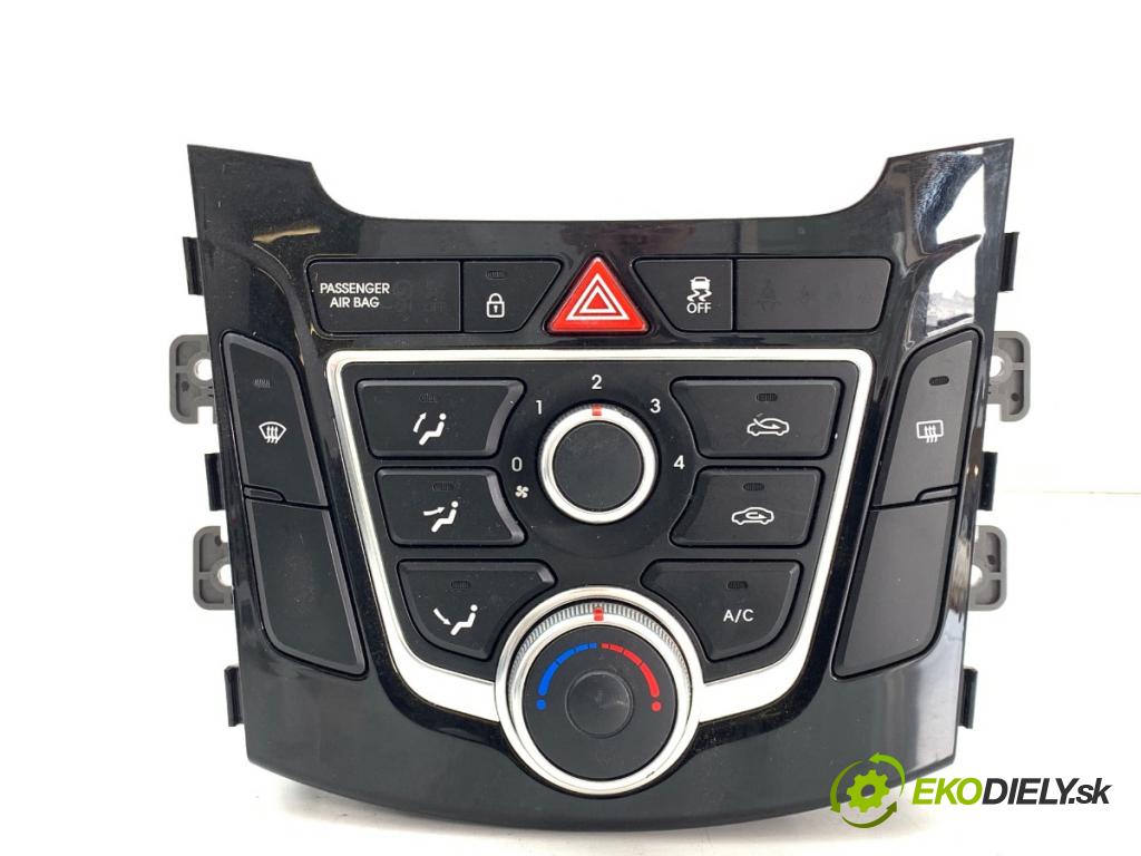 HYUNDAI i30 liftback 2013 73 kW 1.4 1396 Panel ovládaní topení 97250-A6040 (Páčky pod volantem)