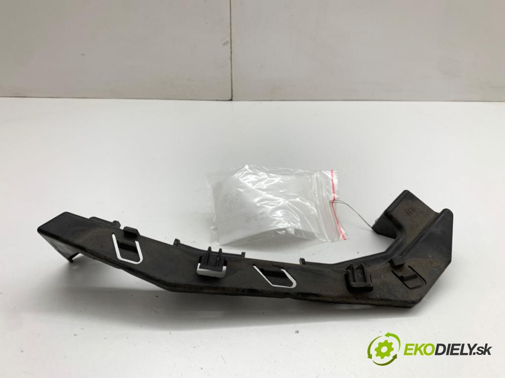 HYUNDAI i30 liftback 2013 73 kW 1.4 1396 úchyt svetla pravý přední část ET030E