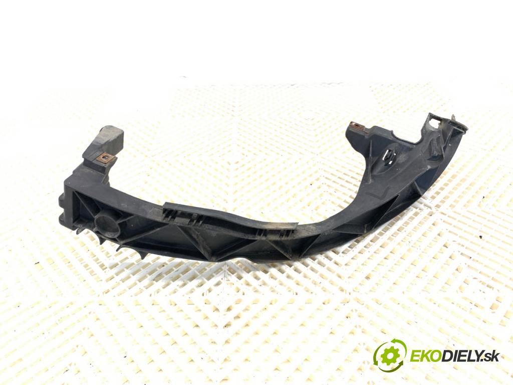 BMW E87 liftback 2004 120 kW 120 d 1995 Úchyt svetla ľavy 7120823