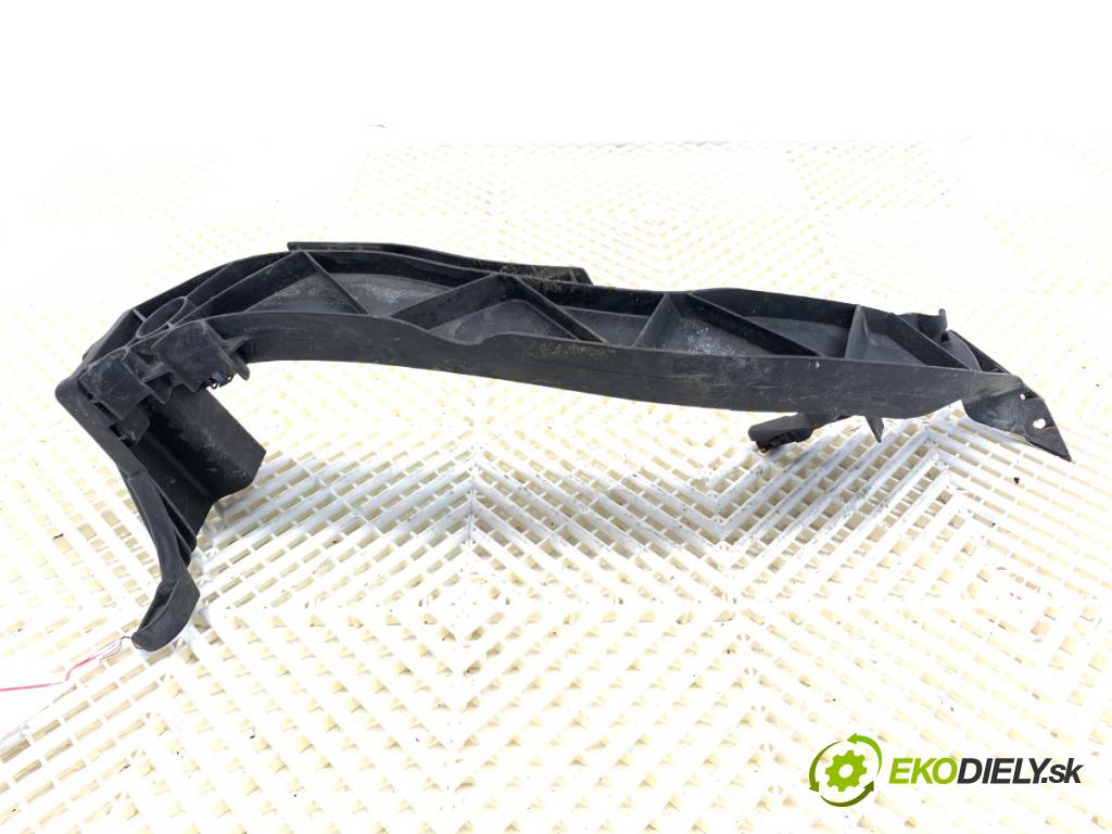 BMW E87 liftback 2004 120 kW 120 d 1995 Úchyt svetla ľavy 7120823