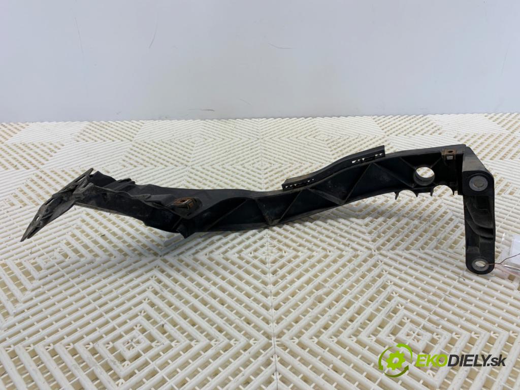 BMW E87 liftback 2004 120 kW 120 d 1995 Úchyt svetla ľavy 7120823