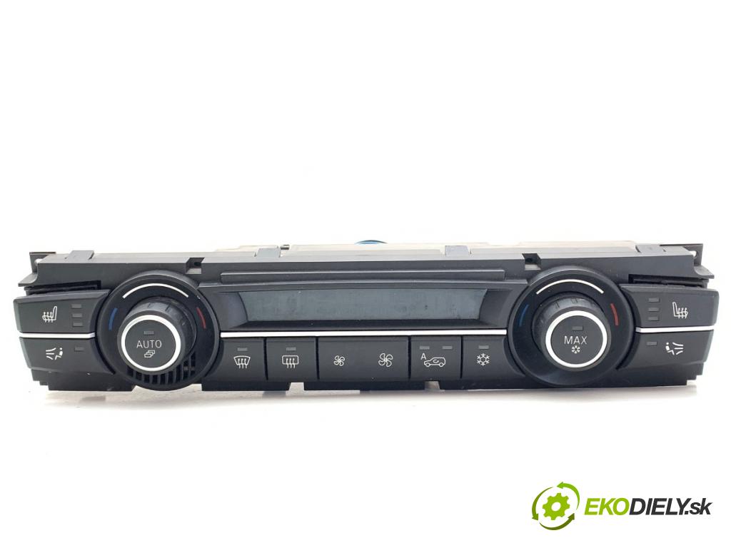 BMW E70 SUV 2011 225 kW xDrive 40 d 2993 Panel ovládania kúrenia 9279654 (Prepínacie páčky pod volantom)