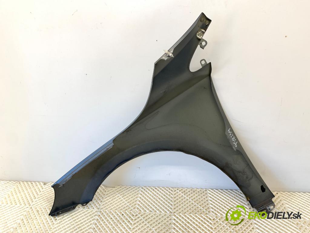VOLVO V40 liftback 2014 84 kW D2 1560 blatník pravý přední část 714-16