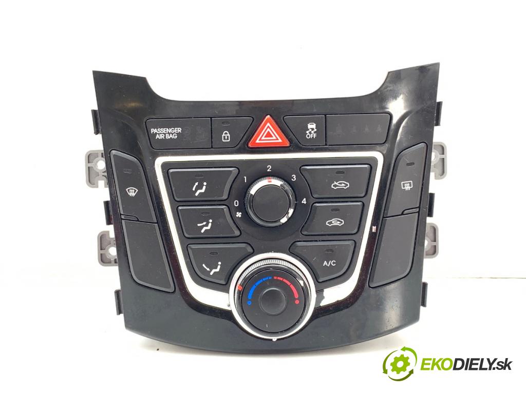 HYUNDAI i30 liftback 2012 73 kW 1.4 1396 Panel ovládaní topení 97250-A6040 (Páčky pod volantem)