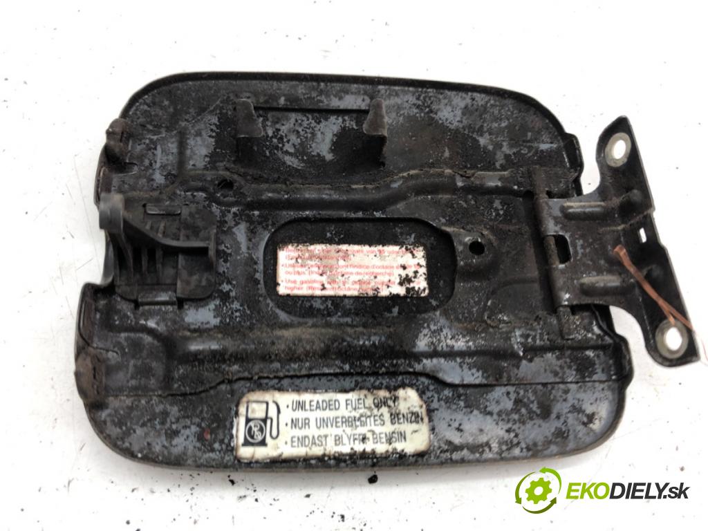 SUZUKI IGNIS II liftback 2006 69 kW 1.3 (RM413) 1328 dvířka nádrže paliva (Klika dveří ostatní)