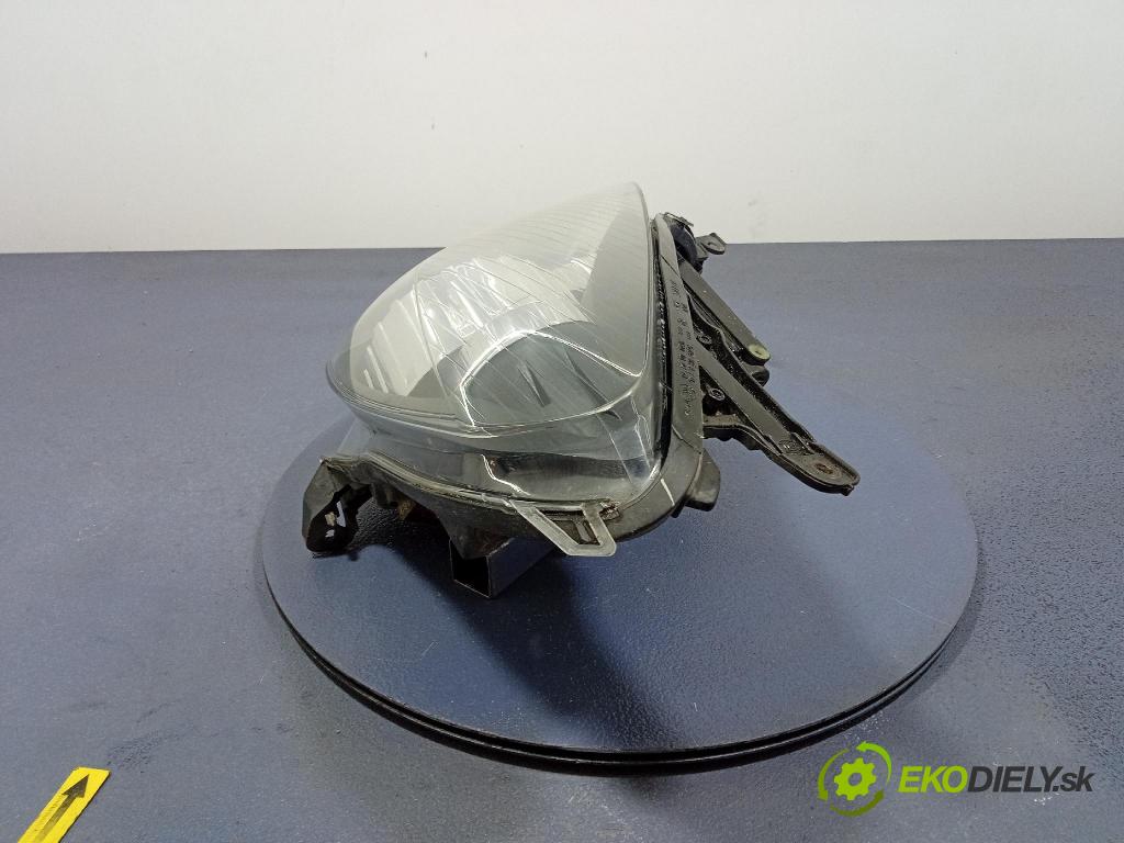 Opel Astra 2004 Reflektor: Vľavo: 93178635
