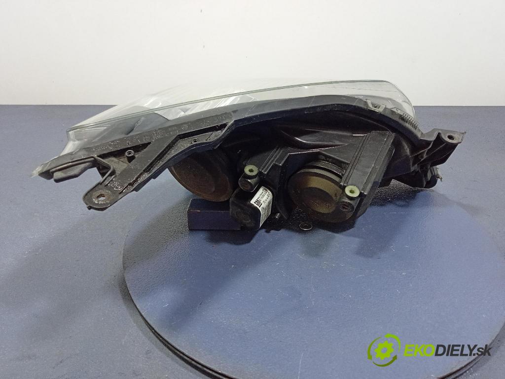 Opel Astra 2004 Reflektor: Vľavo: 93178635