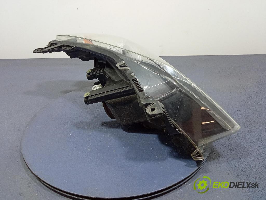 Opel Astra 2004 Reflektor: Vľavo: 93178635