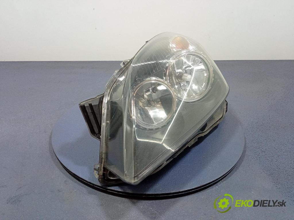 Opel Astra 2004 Reflektor: Vľavo: 93178635