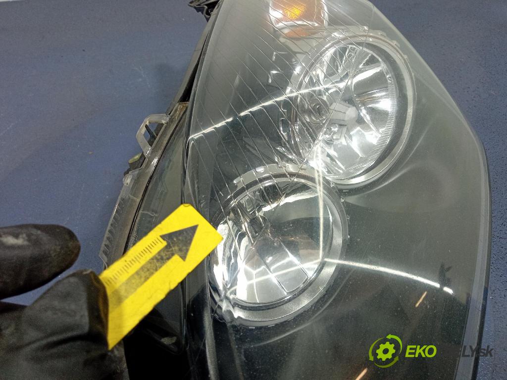 Opel Astra 2004 Reflektor: Vľavo: 93178635