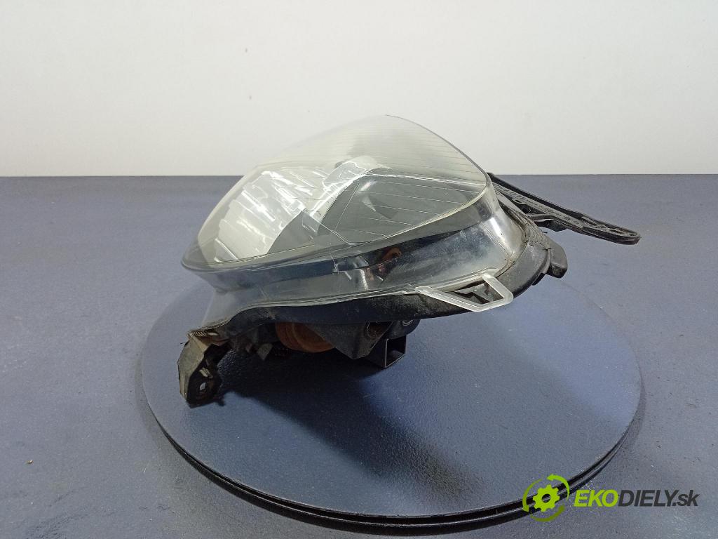 Opel Astra 2006 Reflektor: Vľavo: 20-A390L