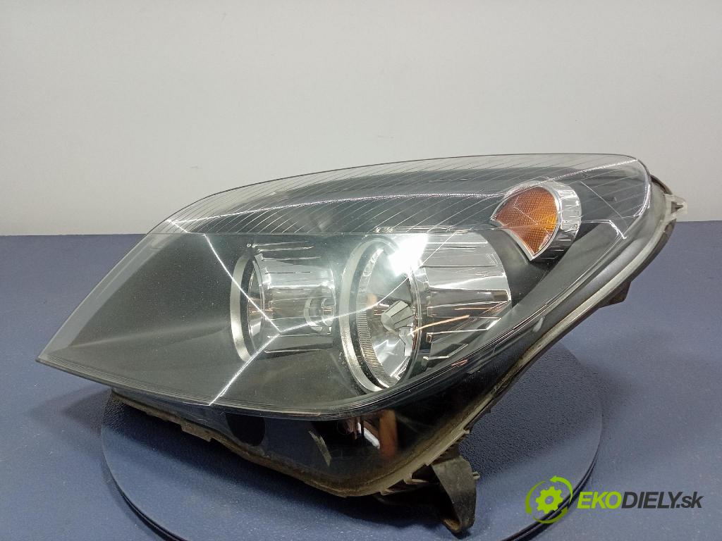 Opel Astra 2010 Reflektor: Vľavo: 24451032