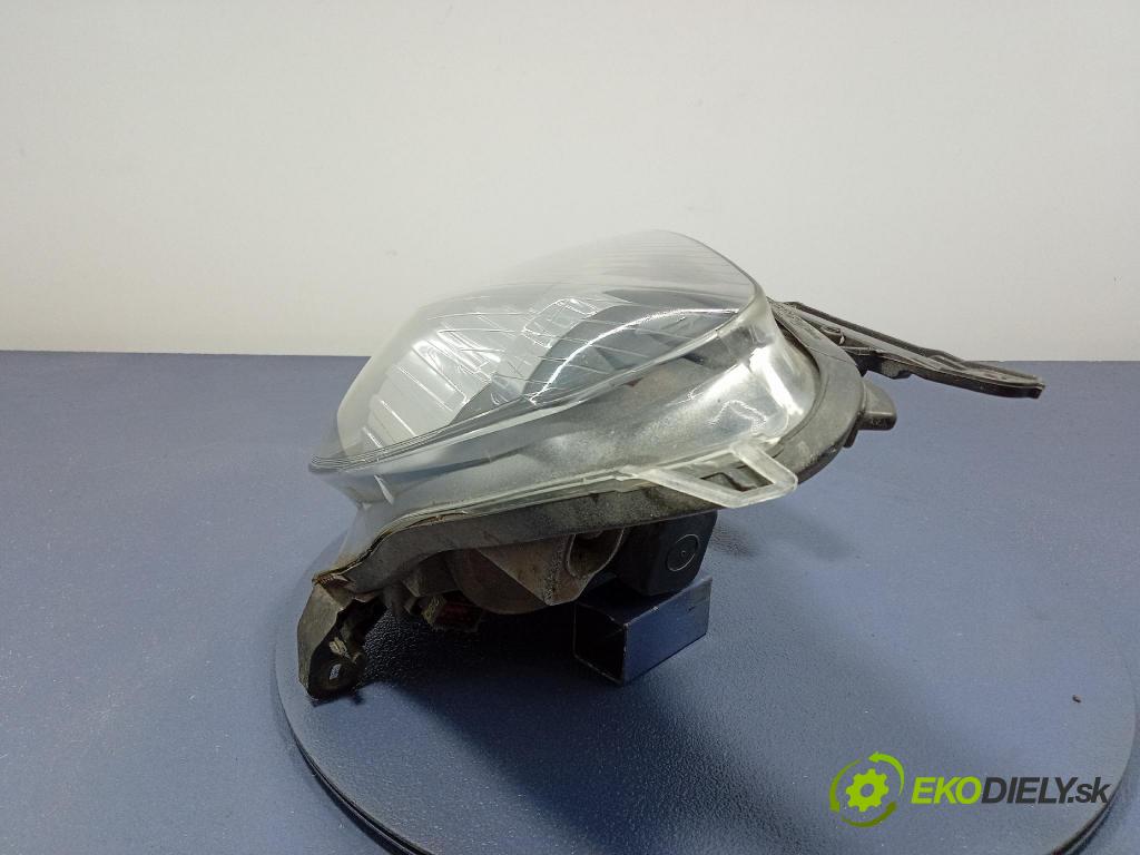 Opel Astra 2010 Reflektor: Vľavo: 24451032
