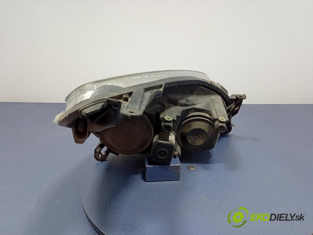 Opel Astra 2010 Reflektor: Vľavo: 24451032