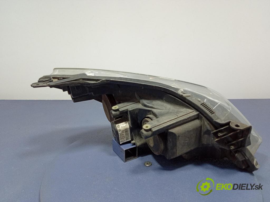 Opel Astra 2010 Reflektor: Vľavo: 24451032