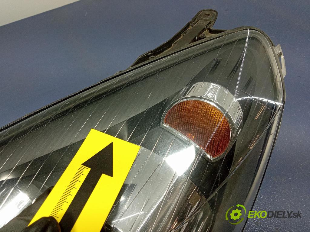 Opel Astra 2010 Reflektor: Vľavo: 24451032