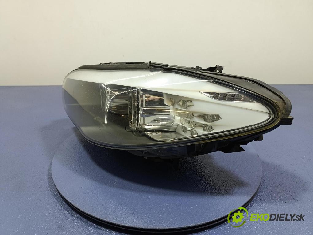 Bmw Seria 5 2011 Reflektor: Vľavo: 7203245