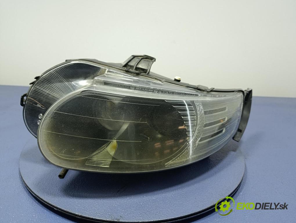 Saab 9-5 2007 Reflektor: Vľavo: